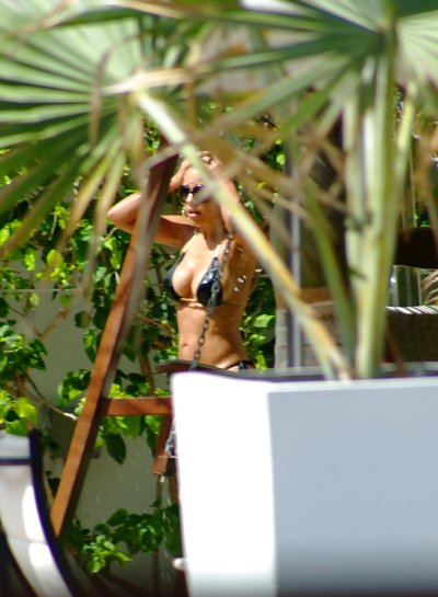 Vida Guerra at the beach in a thong - image content by x_fresh.corereal