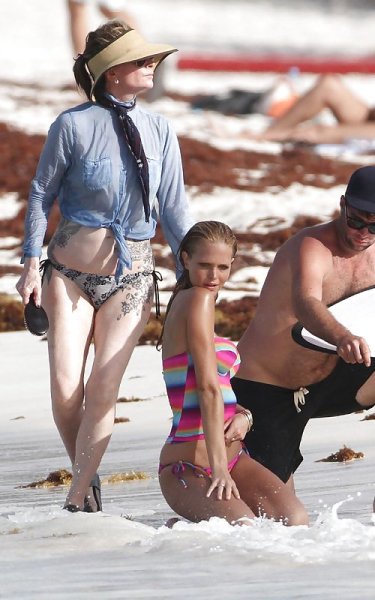 Erin Heatherton Sweating on a beachBikini Shoot - image content by prime953123