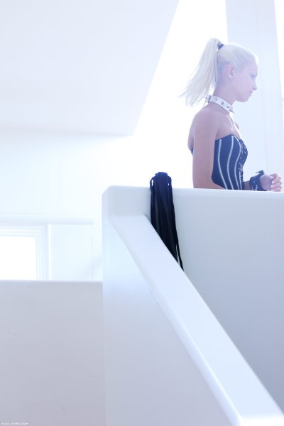 Skinny teen Francesca poses with her tiny tits bare wearing a strapon - image content by smooth.earth